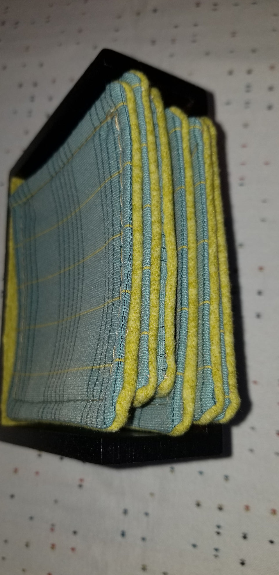 Charlie turquoise and lime green coasters with modern walnut pedestal coaster holder, Carla top view