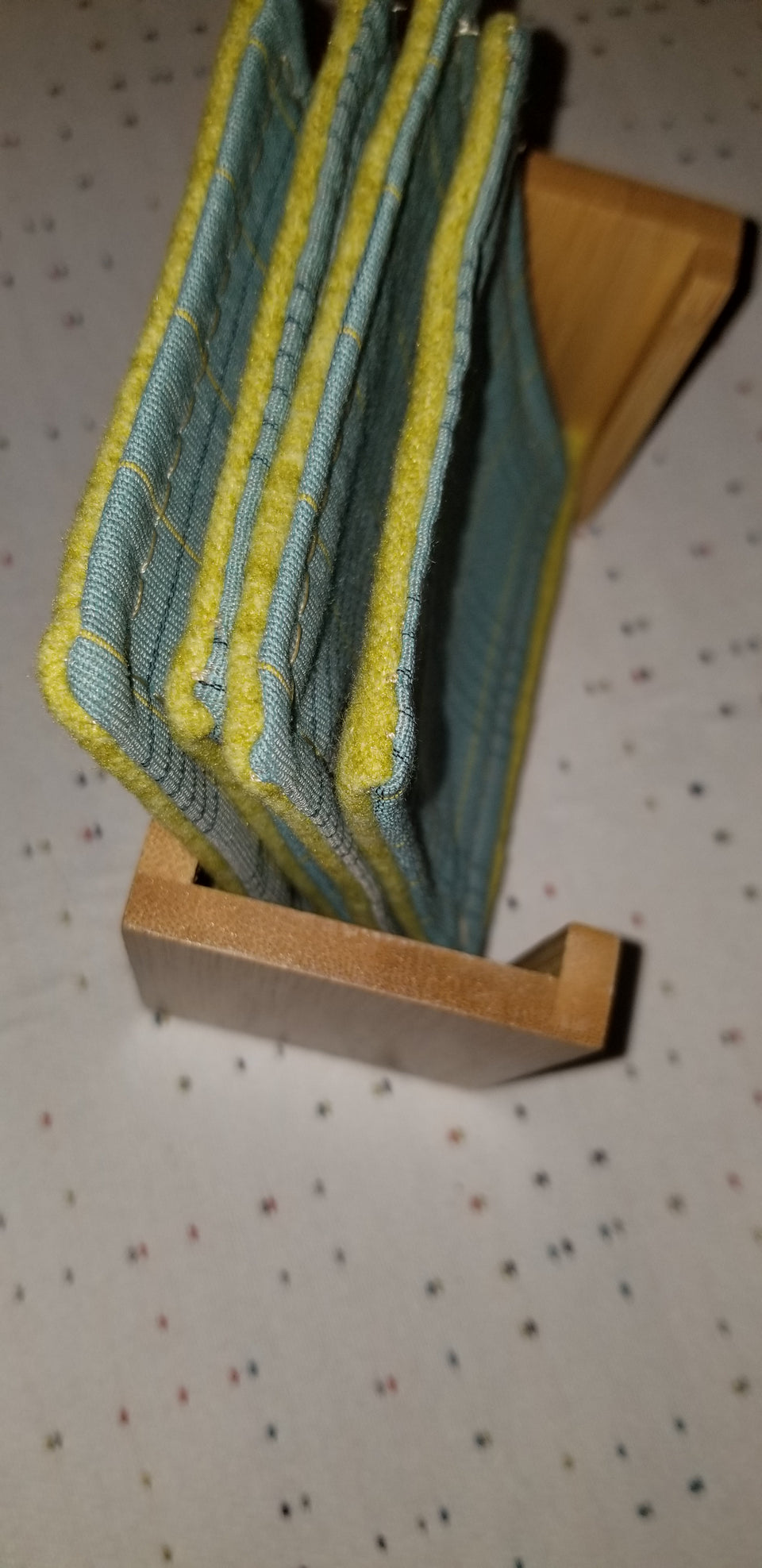 Bamboo coaster holder with turquoise and lime green plaid coasters