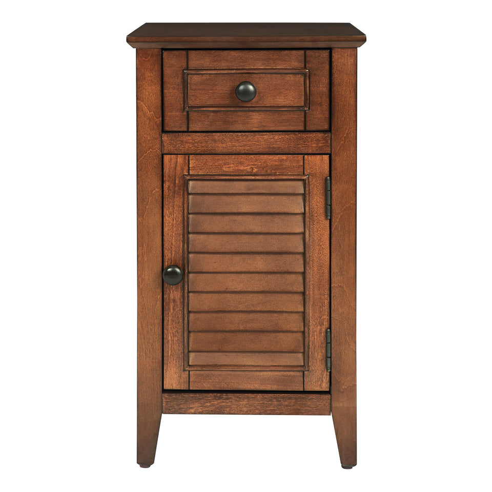 brook chestnut side table. Shutter style door and drawer with black knob. Front view.