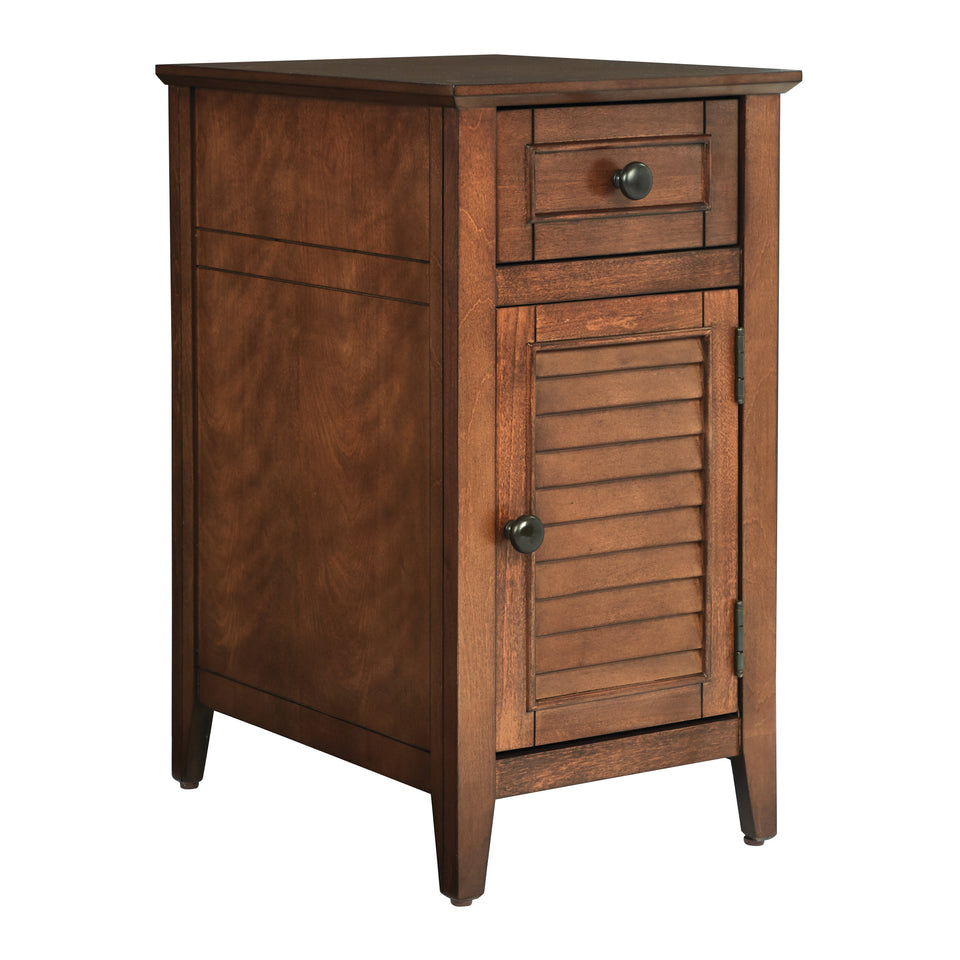 brook chestnut side table. Shutter style door and drawer with black knob. Closed angle view.