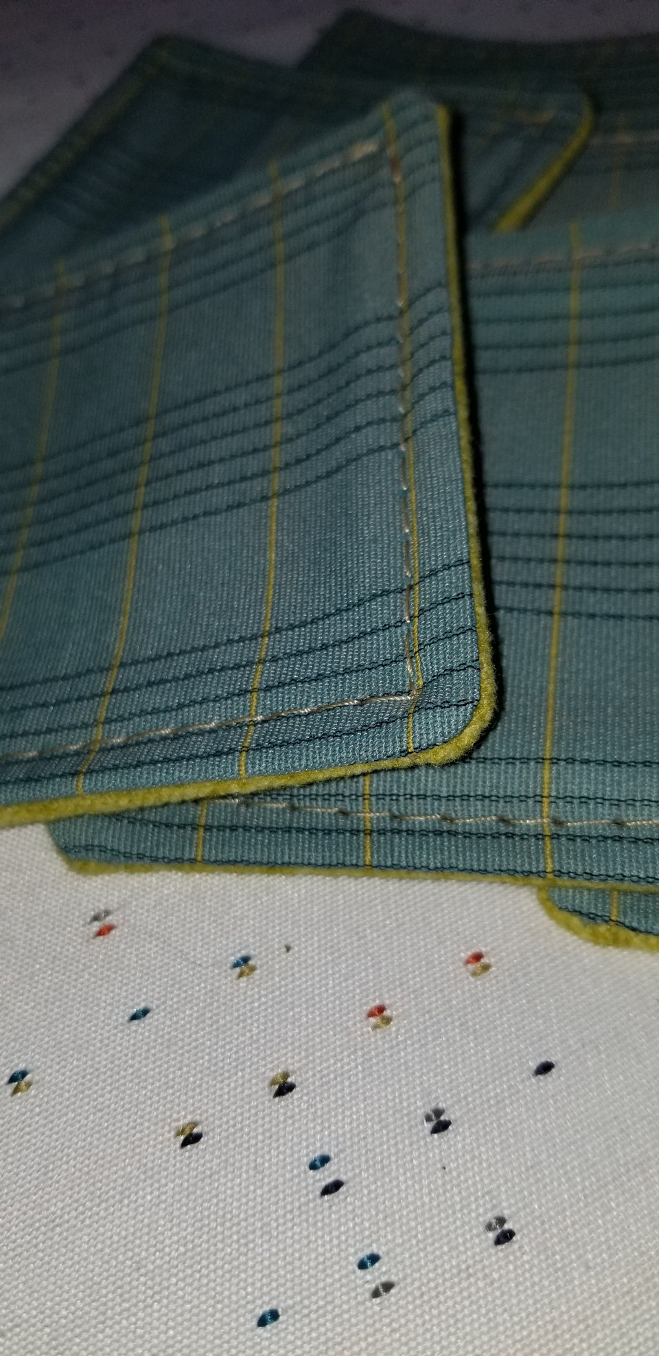 Charlie turquoise and lime green plaid coasters detail.