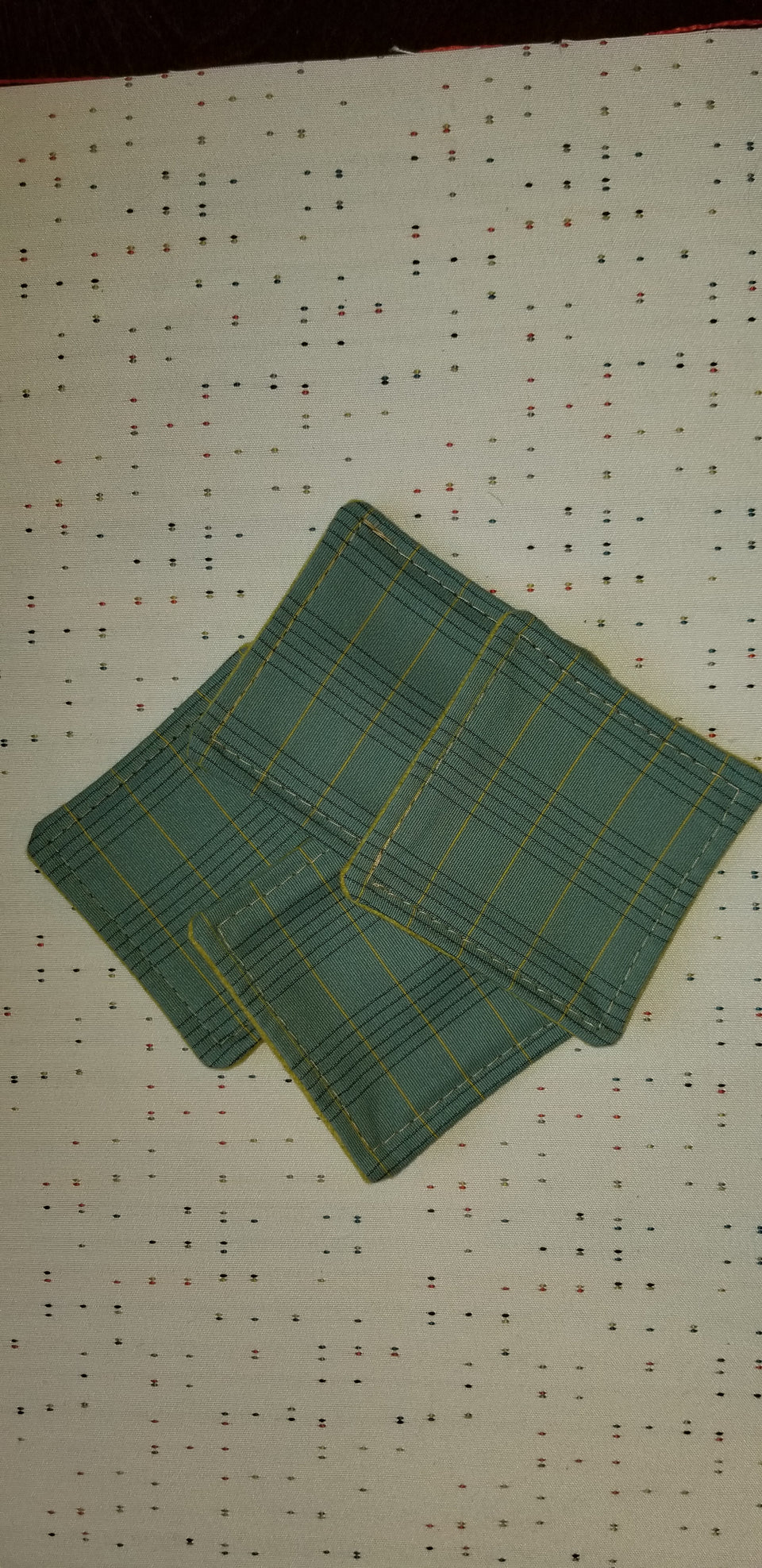 Charlie turquoise and lime green plaid stack of (4) coasters.