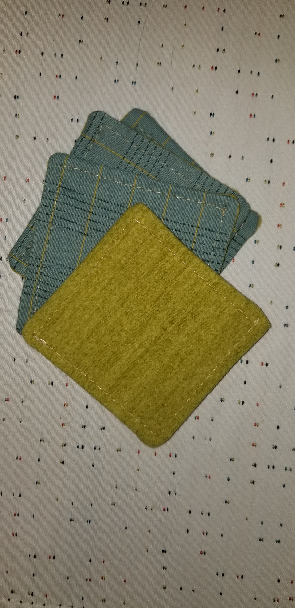 Charlie turquoise and lime green plaid stack of (4) coasters front and back detail.