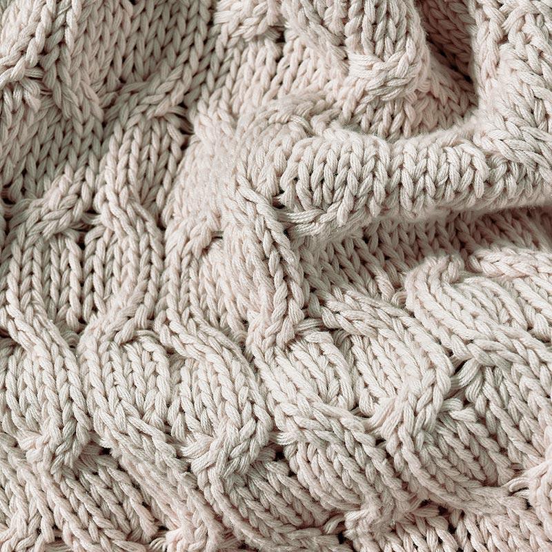 detail view of beige cable knitted  throw blanket from decurban.com