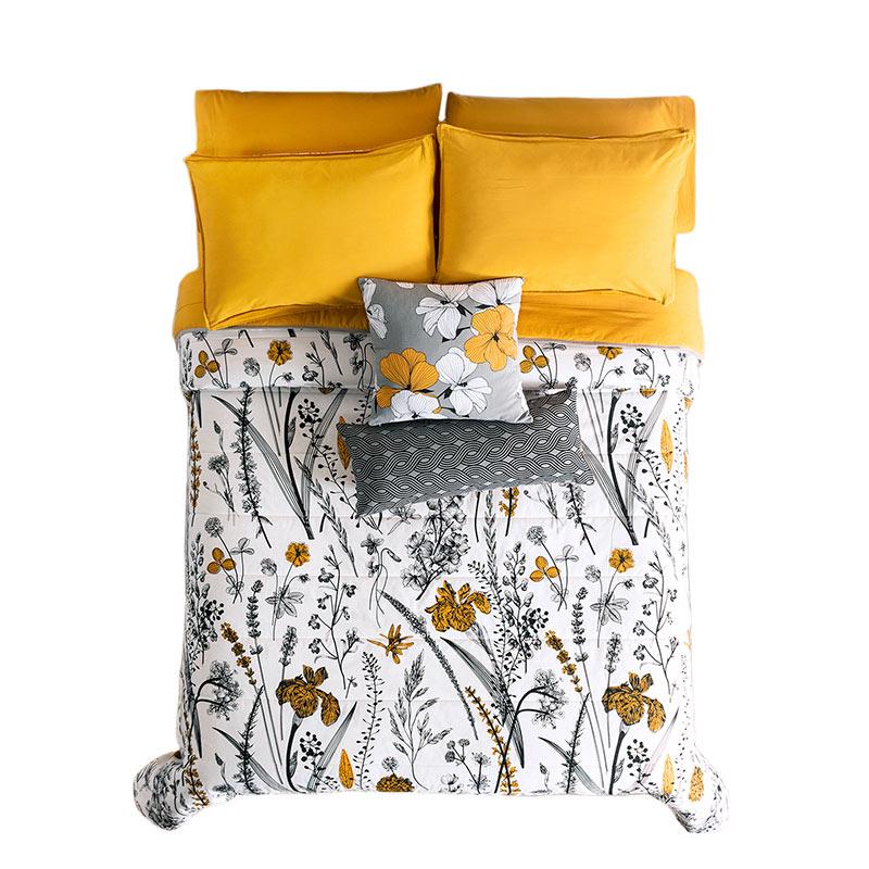Yellow Dahlia modern bedding with yellow, black, & white floral reversible comforter set top view