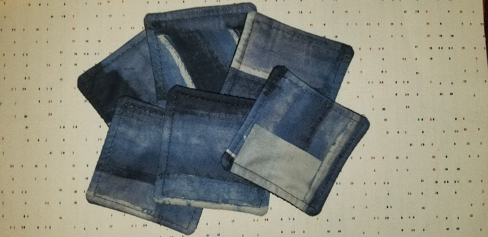 Stack of (6) modern blue and gray Chase coasters.